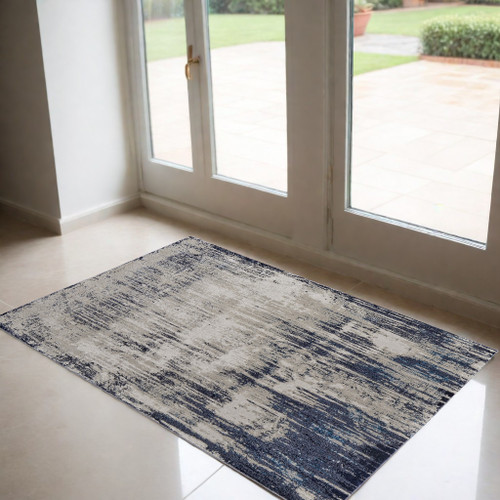 2' X 3' Tan And Blue Abstract Distressed Area Rug Polypropylene, Polyester
