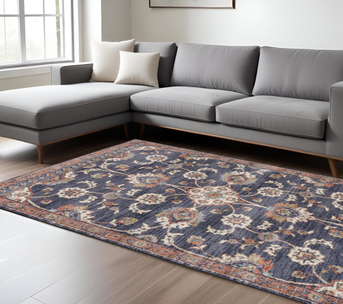 8' X 10' Ivory Orange And Dark Gray Floral Area Rug