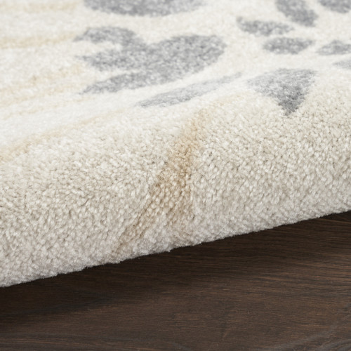 5' x 7' Cream Floral Power Loom Distressed Area Rug