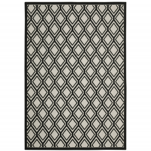 5' X 7' Beige Geometric Stain Resistant Indoor Outdoor Area Rug
