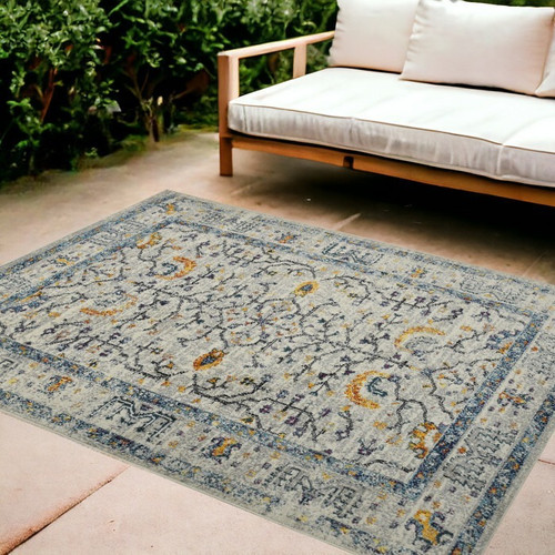 9' X 12' Ivory And Yellow Oriental Distressed Area Rug