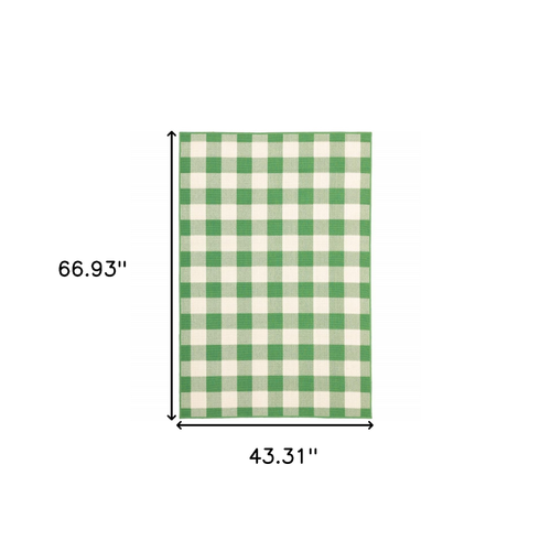 4' X 6' Green and Ivory Geometric Stain Resistant Indoor Outdoor Area Rug