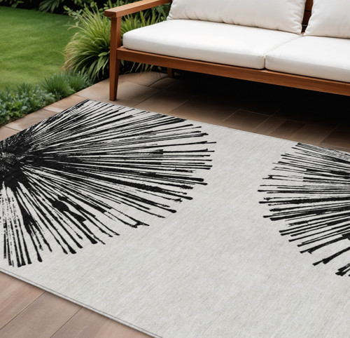 8' X 10' Black And Ivory Abstract Washable Indoor Outdoor Area Rug