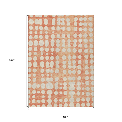 9' X 12' Coral And Ivory Abstract Washable Indoor Outdoor Area Rug