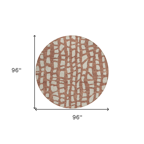 8' Orange And Ivory Round Abstract Washable Indoor Outdoor Area Rug