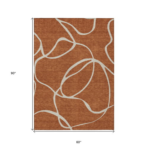 5' X 8' Copper And Ivory Abstract Washable Indoor Outdoor Area Rug