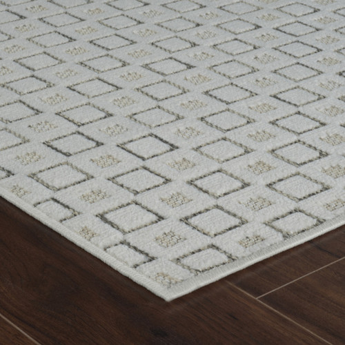 5' X 7' Cream and Beige Geometric Distressed Indoor Outdoor Area Rug