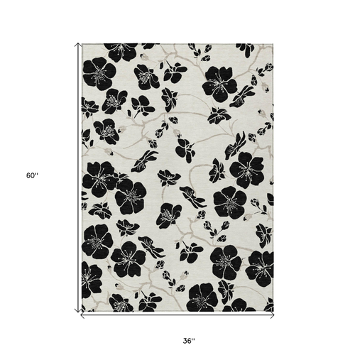 3' X 5' Ivory And Black Floral Washable Indoor Outdoor Area Rug