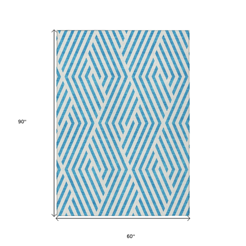 5' X 8' Teal and White Geometric Washable Non Skid Indoor Outdoor Area Rug