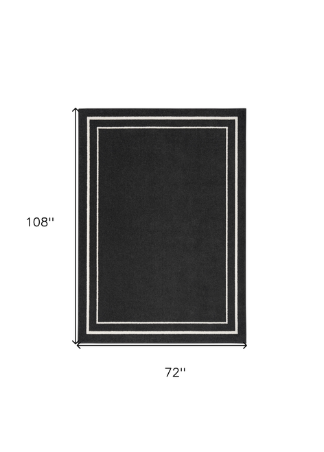 6' X 9' Black And Ivory Indoor Outdoor Area Rug