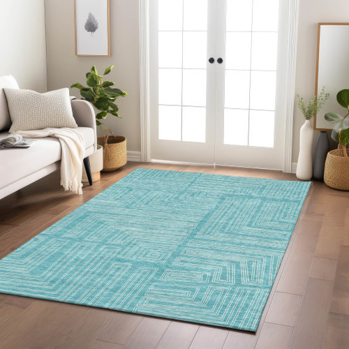 5' X 8' Turquoise And Ivory Geometric Washable Indoor Outdoor Area Rug