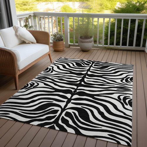3' X 5' Black And Ivory Animal Print Washable Indoor Outdoor Area Rug