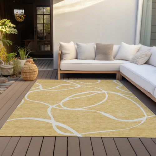 5' X 8' Gold And Ivory Abstract Washable Indoor Outdoor Area Rug