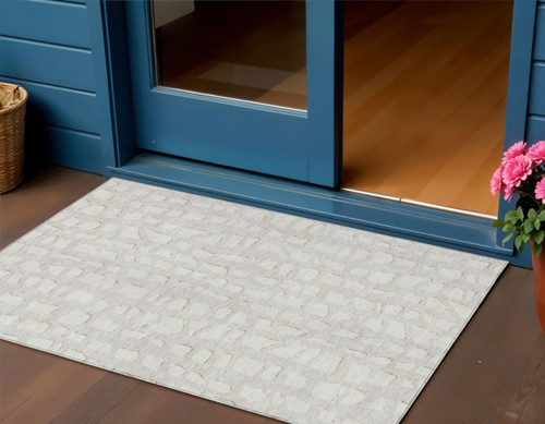 3' X 5' Ivory And Beige Abstract Washable Indoor Outdoor Area Rug