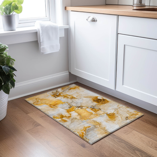 2' X 3' Orange and Ivory Abstract Washable Indoor Outdoor Area Rug
