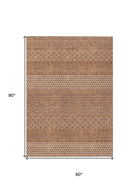 5' X 8' Orange And Ivory Chevron Washable Indoor Outdoor Area Rug