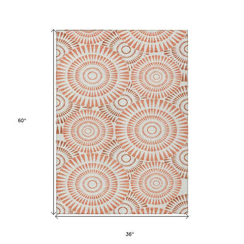 3' X 5' Coral And Ivory Geometric Washable Indoor Outdoor Area Rug