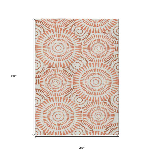 3' X 5' Coral And Ivory Geometric Washable Indoor Outdoor Area Rug