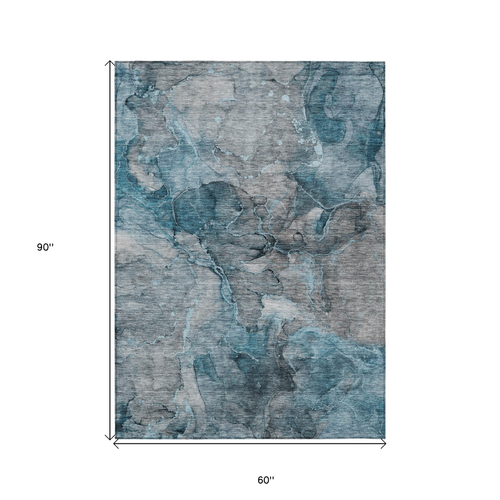 5' X 8' Teal Blue And Navy Blue Abstract Washable Indoor Outdoor Area Rug