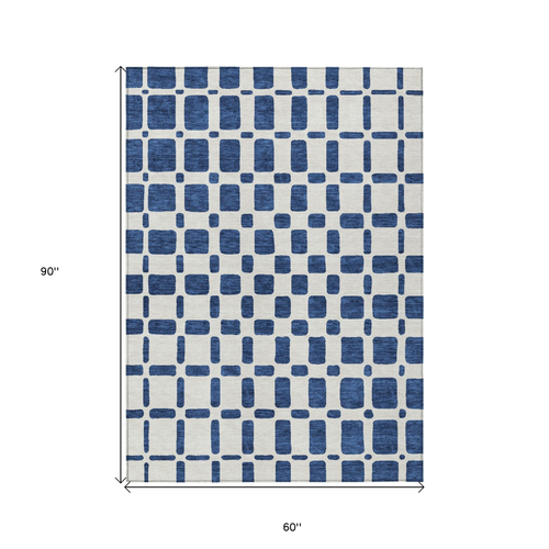 5' X 8' Navy Blue And Ivory Geometric Washable Indoor Outdoor Area Rug