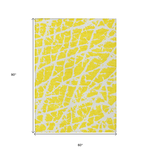 5' X 8' Yellow and White Abstract Washable Non Skid Indoor Outdoor Area Rug
