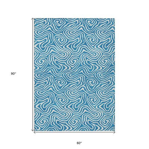 5' X 8' Teal Blue And Ivory Abstract Washable Indoor Outdoor Area Rug