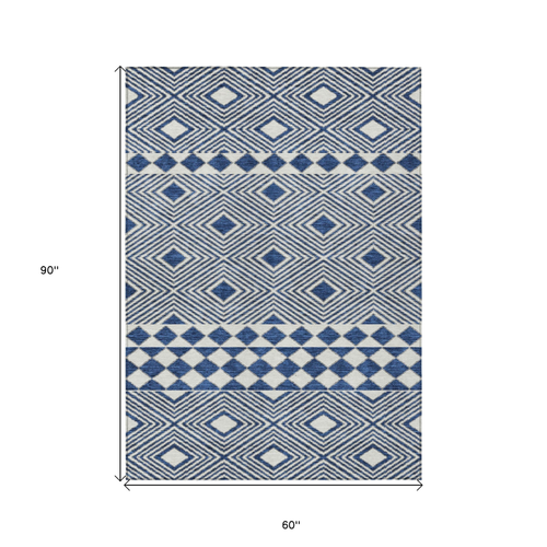 5' X 8' Navy Blue And Ivory Geometric Washable Indoor Outdoor Area Rug