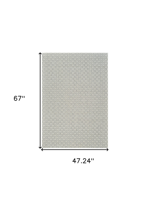 4' X 6' Cream and Beige Geometric Distressed Indoor Outdoor Area Rug