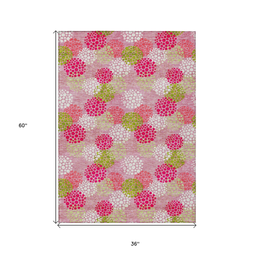 3' X 5' Pink Green And Ivory Polka Dot Washable Indoor Outdoor Area Rug