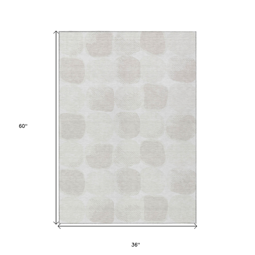 3' X 5' Ivory And Beige Abstract Washable Indoor Outdoor Area Rug