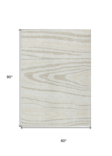 5' X 8' Ivory Beige And Taupe Faux Bois Washable Indoor Outdoor Area Rug
