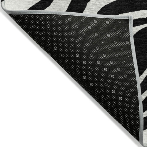 5' X 8' Black And Ivory Animal Print Washable Indoor Outdoor Area Rug