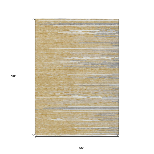 5' X 8' Gold Gray And Ivory Striped Washable Indoor Outdoor Area Rug