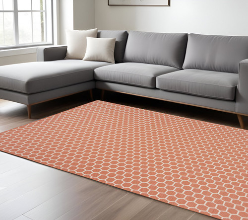 8' X 10' Coral And Ivory Geometric Indoor Outdoor Area Rug