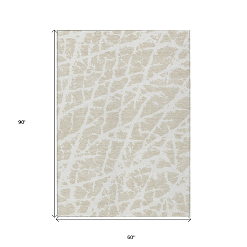 5' X 8' Beige and Ivory Abstract Washable Non Skid Indoor Outdoor Area Rug