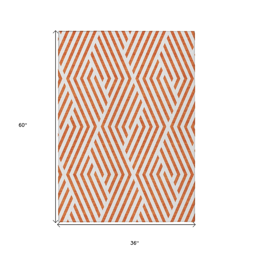 3' X 5' Orange And White Geometric Washable Indoor Outdoor Area Rug