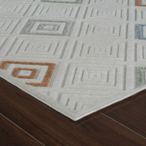 5' X 7' Cream and Beige Geometric Distressed Indoor Outdoor Area Rug