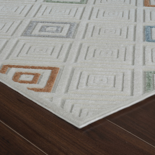 5' X 7' Cream and Beige Geometric Distressed Indoor Outdoor Area Rug