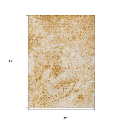 3' X 5' Cream and Gold Abstract Washable Non Skid Indoor Outdoor Area Rug