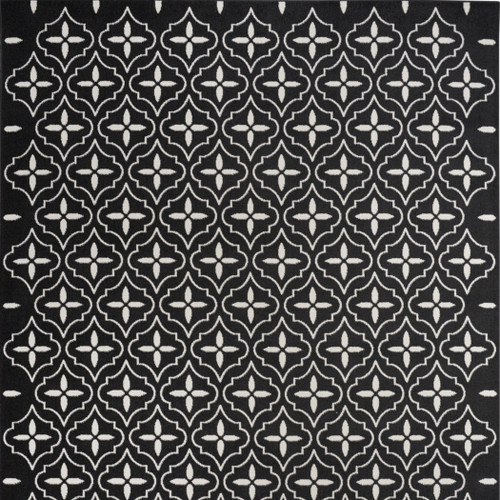 5' X 7' Black And Ivory Geometric Indoor Outdoor Area Rug