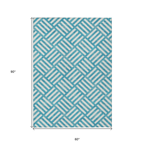 5' X 8' Teal Blue And Ivory Geometric Washable Indoor Outdoor Area Rug