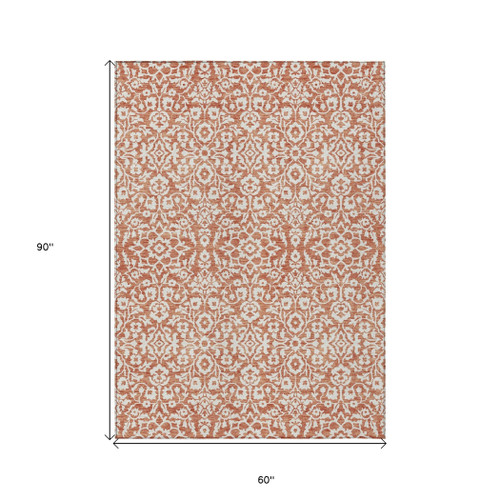 5' X 8' Coral And Ivory Damask Washable Indoor Outdoor Area Rug