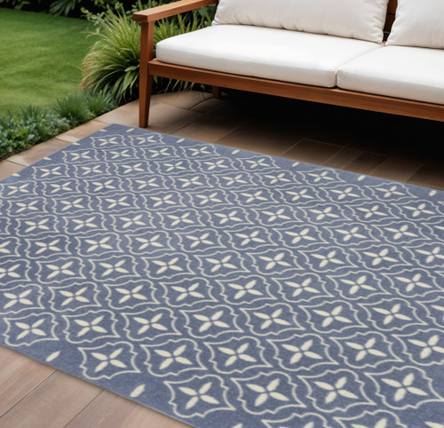 6' X 9' Blue And Ivory Geometric Indoor Outdoor Area Rug