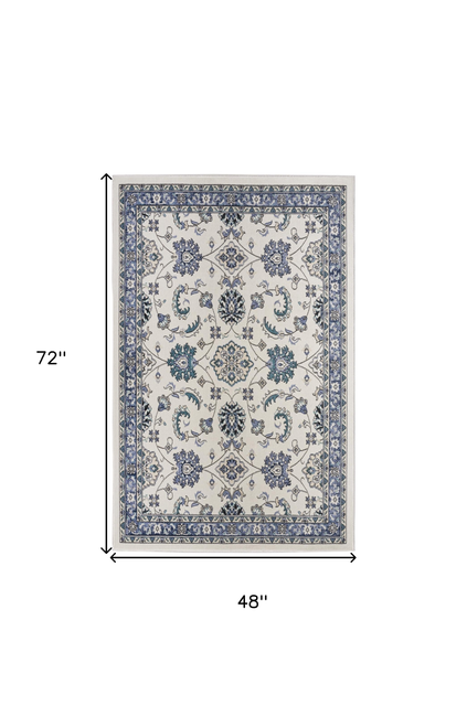 4' X 6' Ivory And Blue Floral Indoor Outdoor Area Rug
