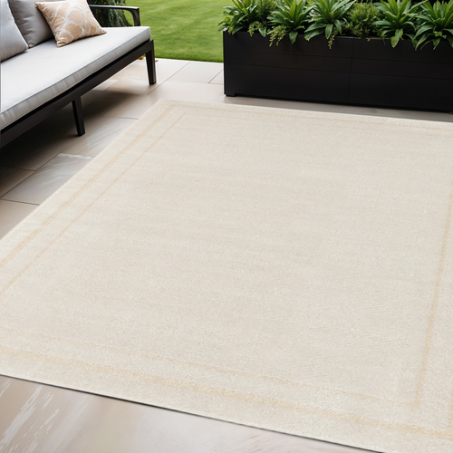 5' X 7' Ivory And Gold Indoor Outdoor Area Rug
