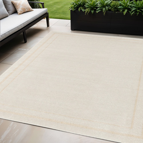 5' X 7' Ivory And Gold Indoor Outdoor Area Rug