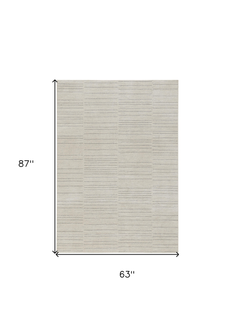 5' X 7' Gray And Ivory Abstract Area Rug