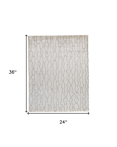 2' X 3' Gray and Ivory Abstract Hand Woven Area Rug