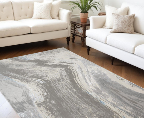 10' X 13' Gray Ivory And Blue Abstract Area Rug