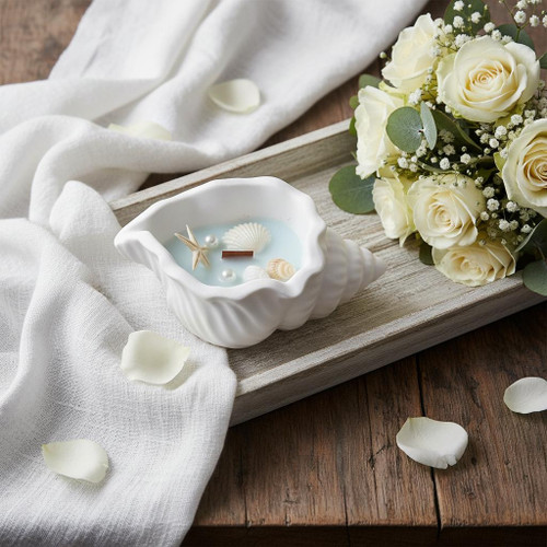 6" Light Blue Ocean Breeze Scented Candle In White Resin Novelty Holder With Shells - 880024695983